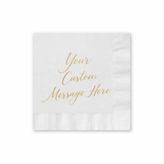 white napkin with gold cursive text